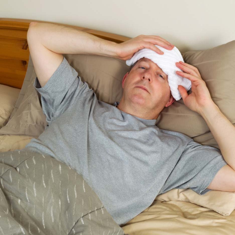 Verzuim, zieke werknemer in bed